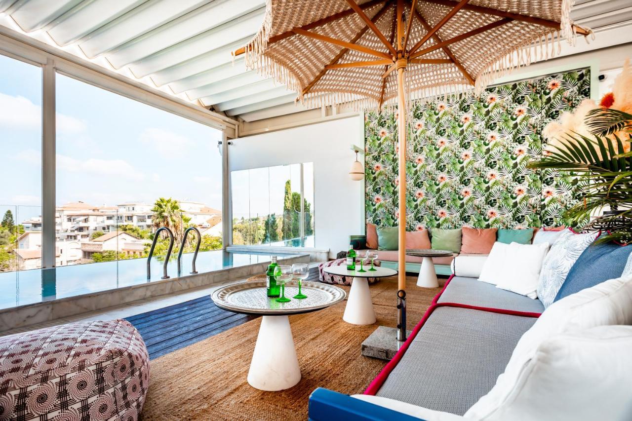 Lear Sense Hotel Gedera Bagian luar foto