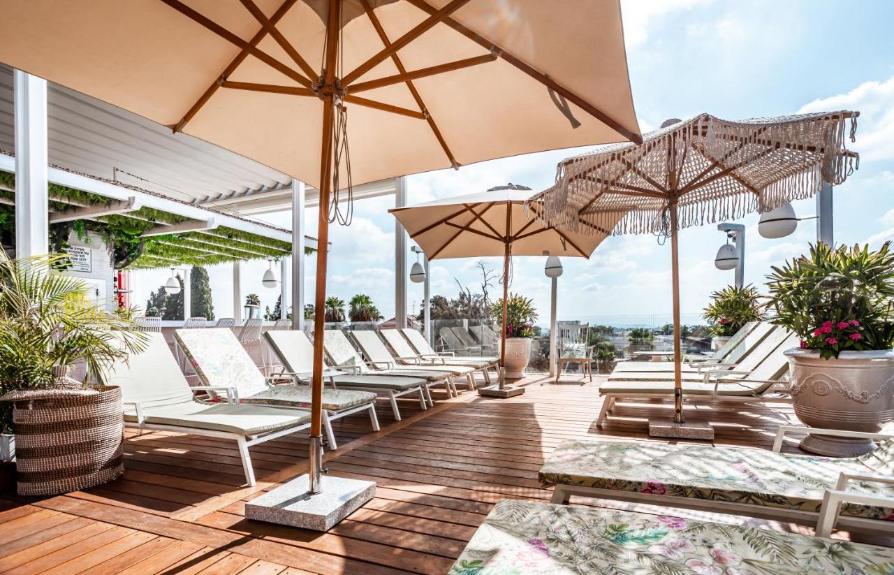 Lear Sense Hotel Gedera Bagian luar foto