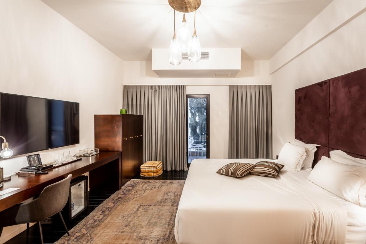 Lear Sense Hotel Gedera Bagian luar foto