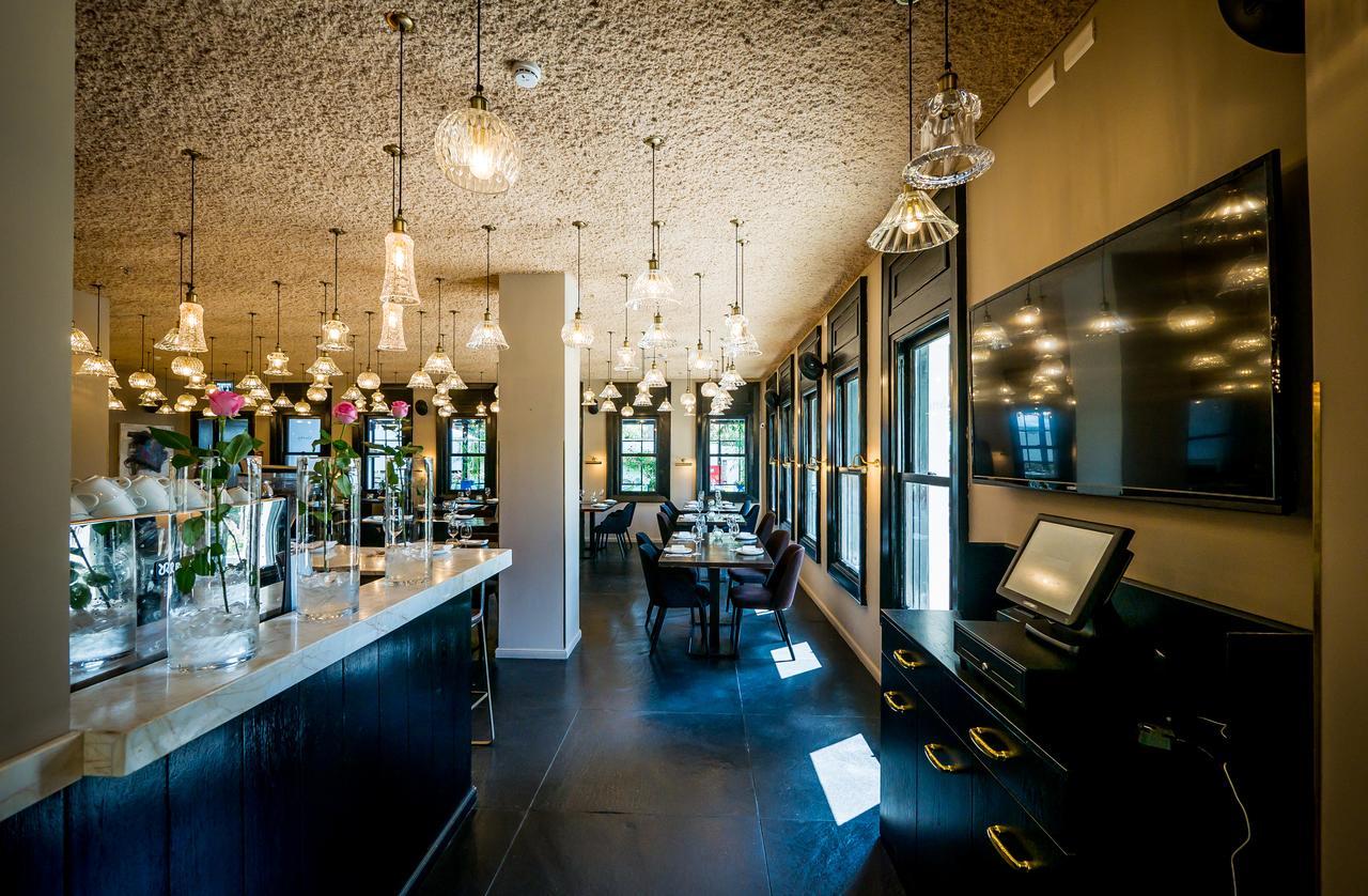 Lear Sense Hotel Gedera Bagian luar foto