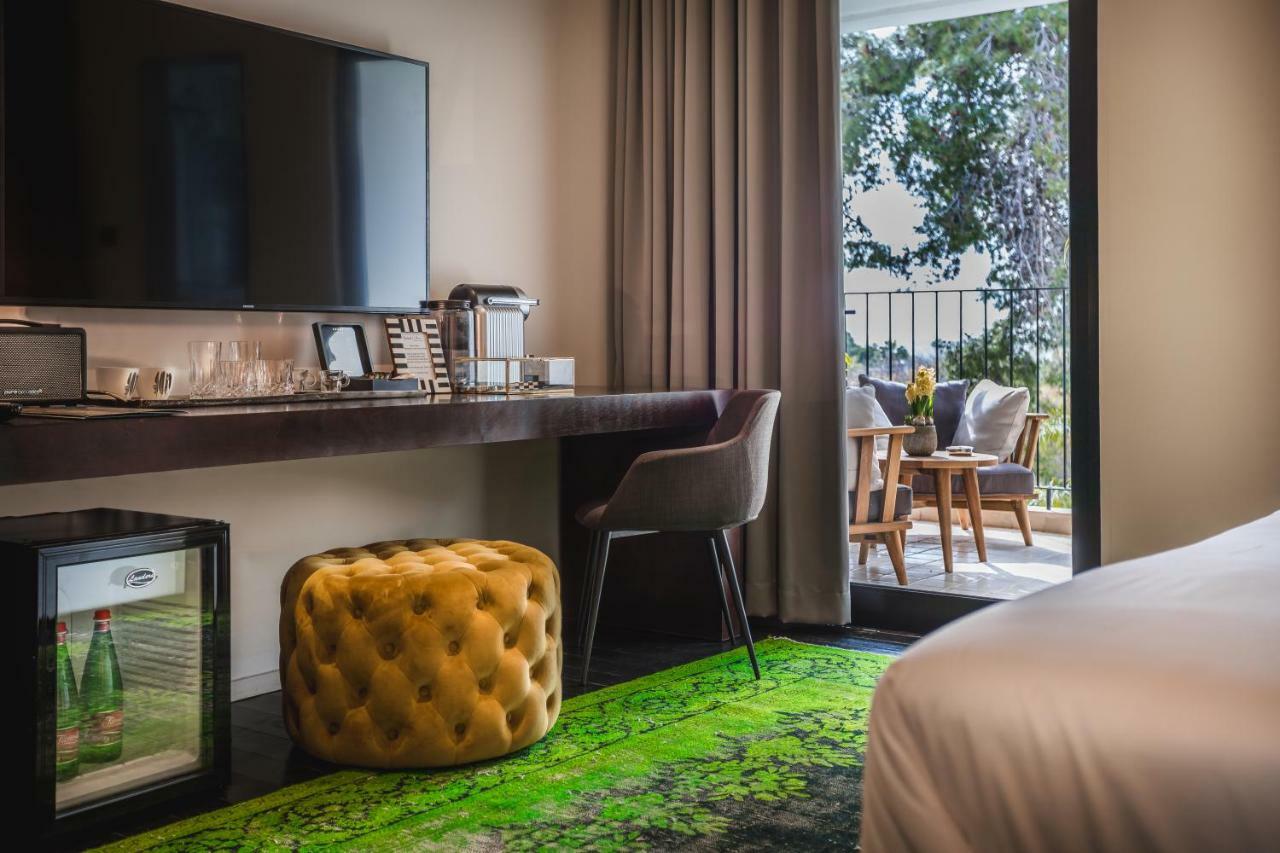 Lear Sense Hotel Gedera Bagian luar foto