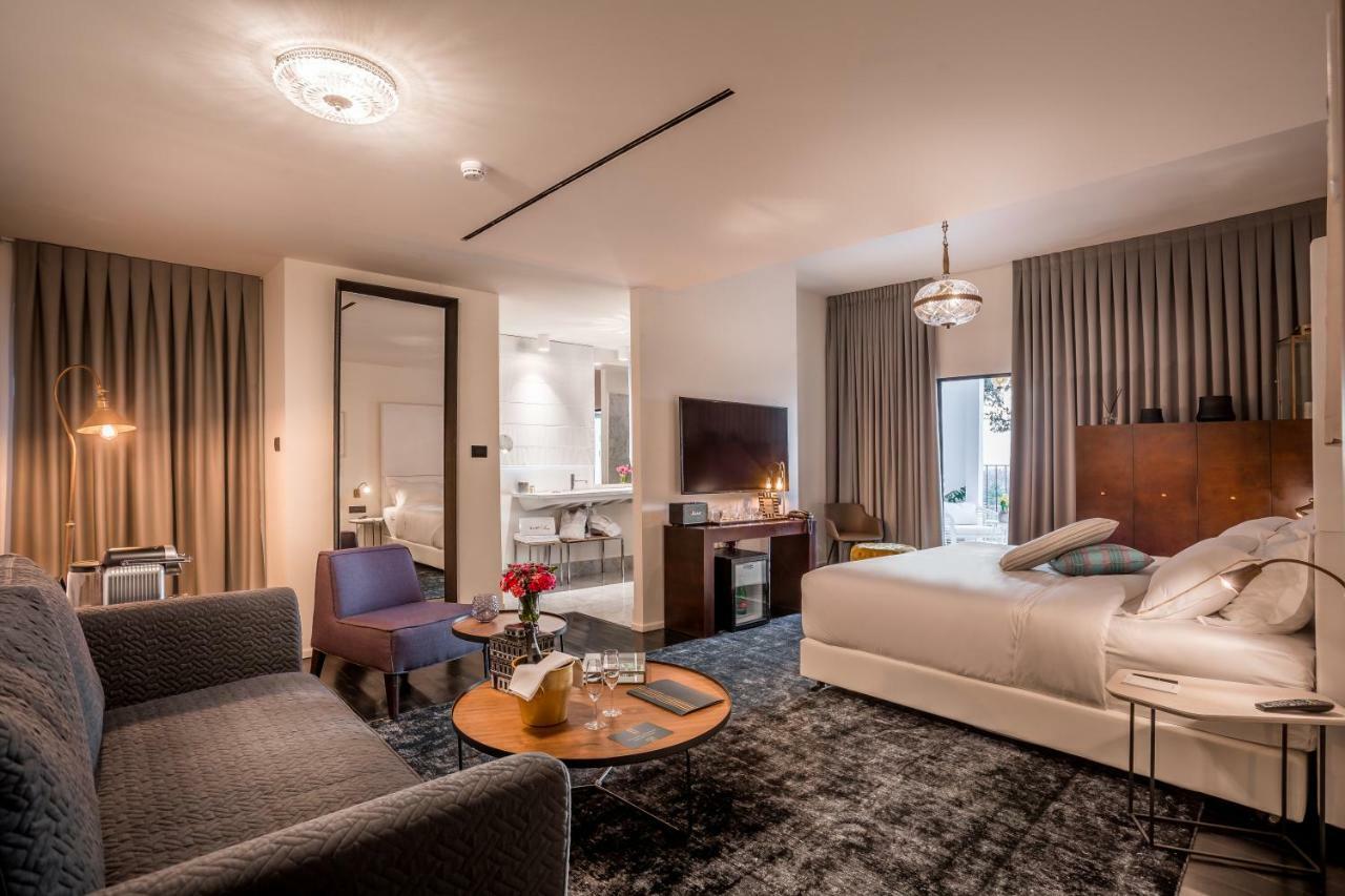 Lear Sense Hotel Gedera Bagian luar foto