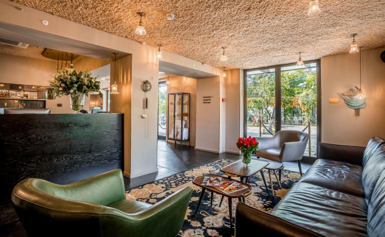 Lear Sense Hotel Gedera Bagian luar foto